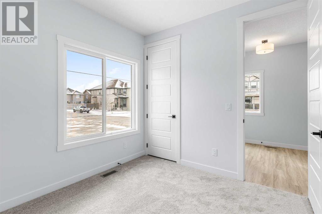 617 Baywater Manor Sw, Airdrie, Alberta  T4B 5R7 - Photo 6 - A2204707