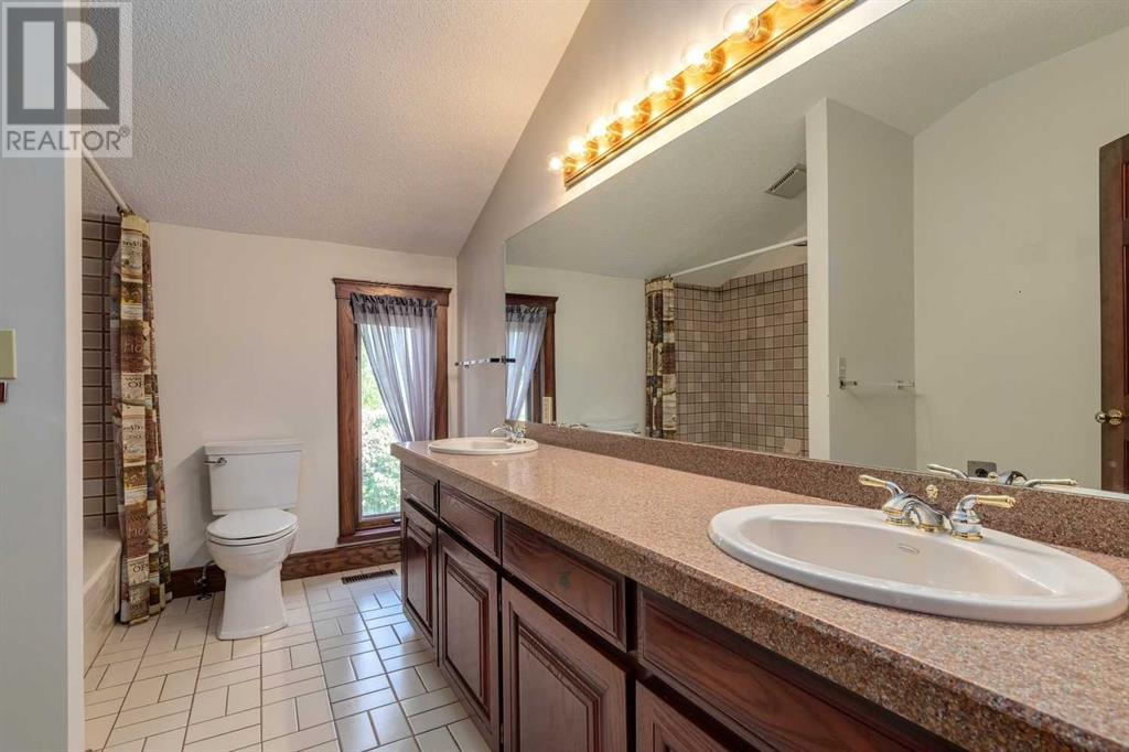 108 Coach Grove Place Sw, Calgary, Alberta  T3H 1J2 - Photo 34 - A2229859