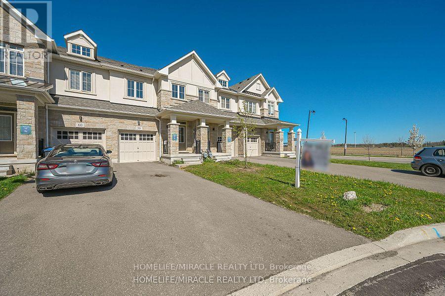 58 Doris Pawley Crescent, Caledon, Ontario  L7C 4E7 - Photo 2 - W12217602