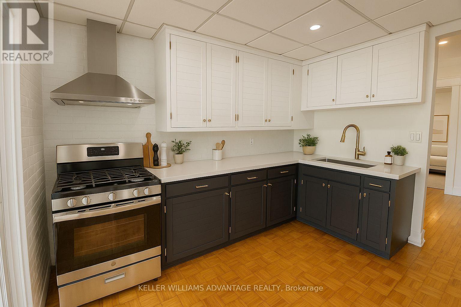 31 Hiltz Avenue, Toronto, Ontario  M4L 2N6 - Photo 6 - E12148162