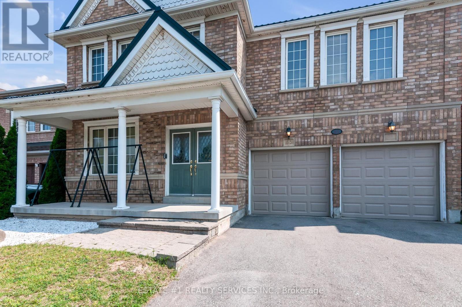 65 Brisdale Drive, Brampton (Fletcher's Meadow), Ontario  L7A 3C1 - Photo 2 - W12214749