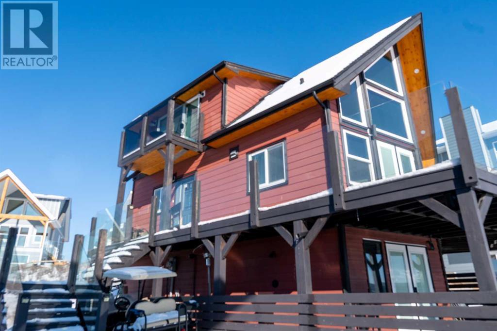 456 Cottageclub Cove, Rural Rocky View County, Alberta  T4C 1B1 - Photo 3 - A2207399