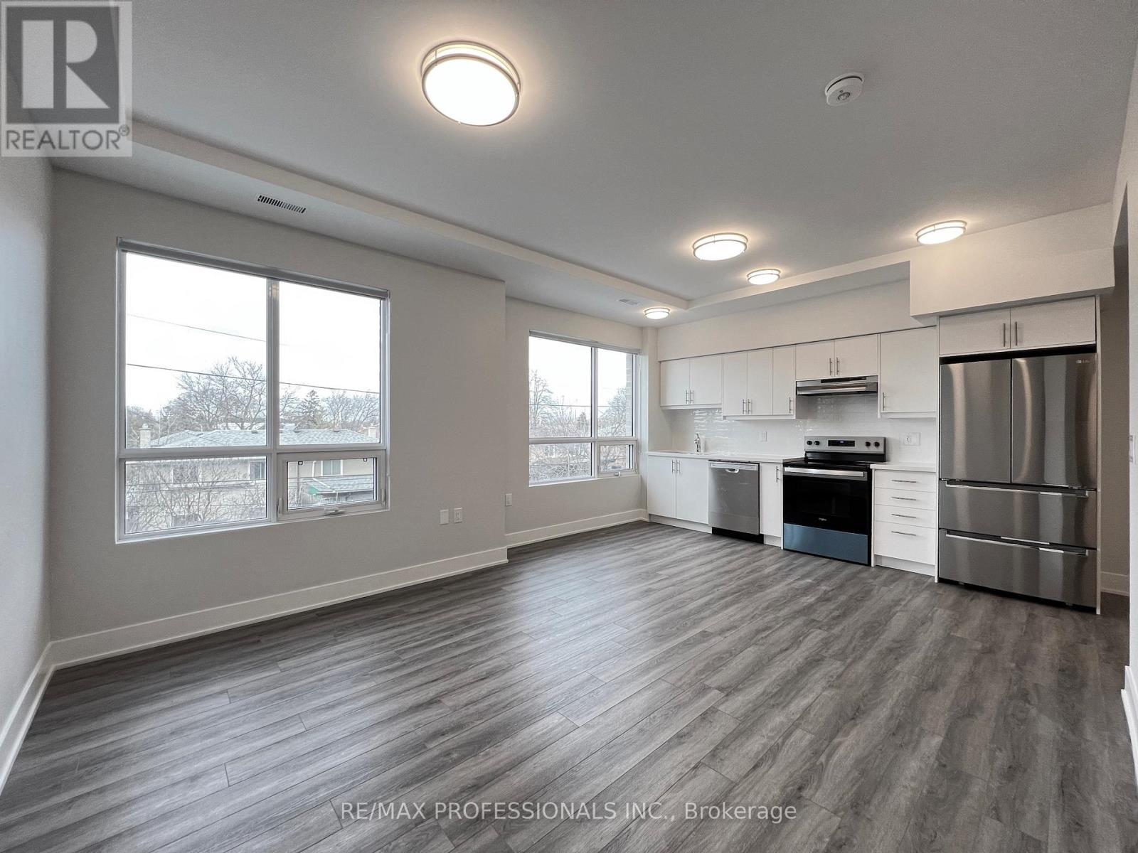 110 - 62 Dixfield Drive, Toronto, Ontario  M9C 3W1 - Photo 4 - W12217890