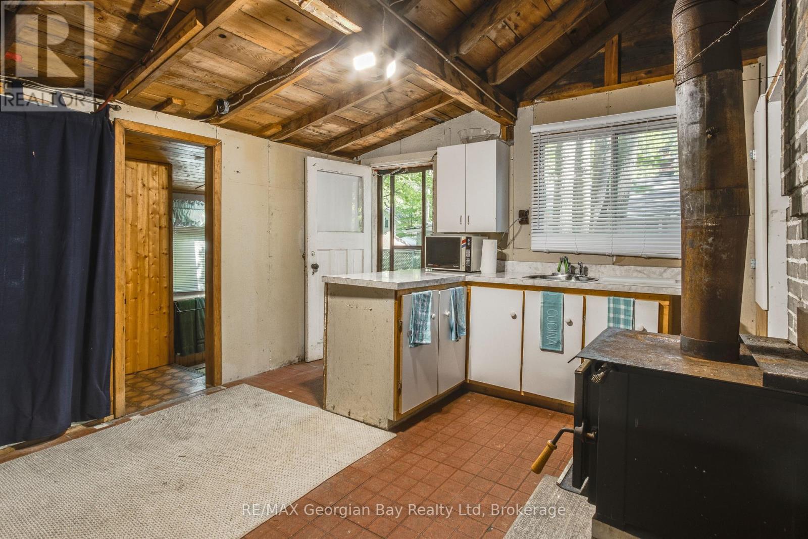 1209 Tiny Beaches Road S, Tiny, Ontario  L0L 2T0 - Photo 11 - S12218431