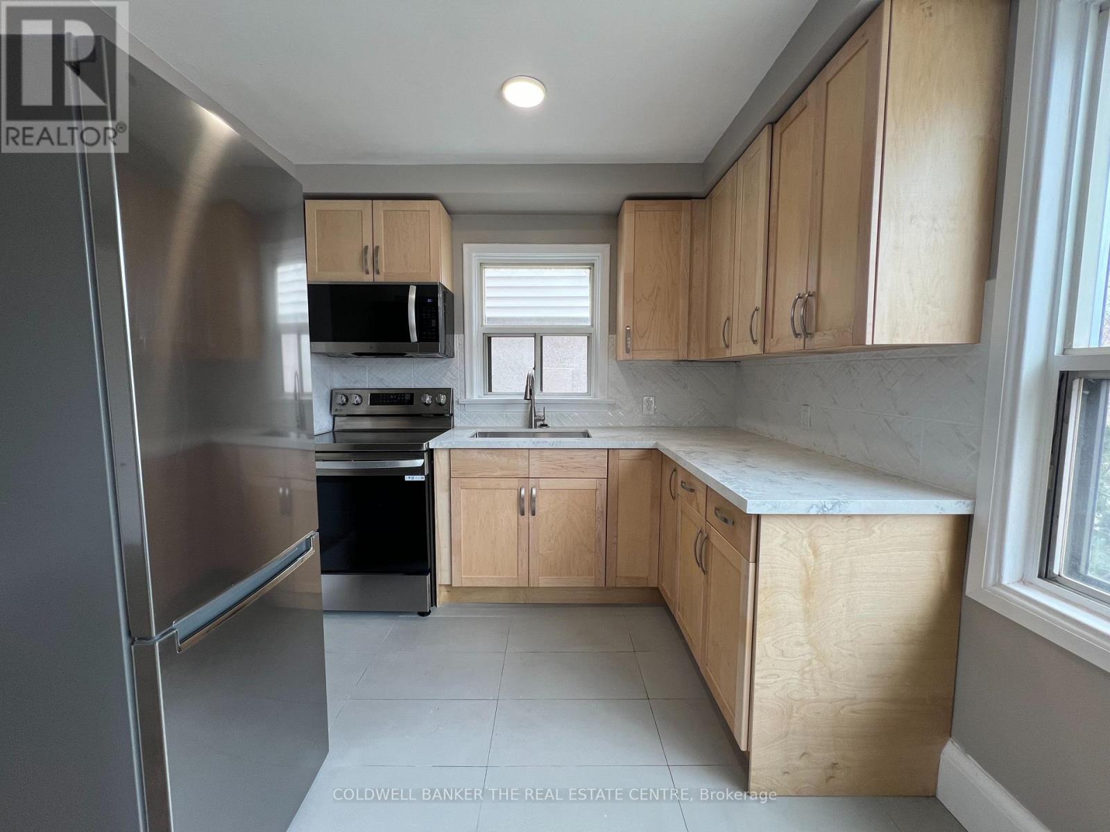 4 - 108 Grandville Avenue, Toronto (Rockcliffe-Smythe), Ontario  M6N 4V2 - Photo 4 - W12218277