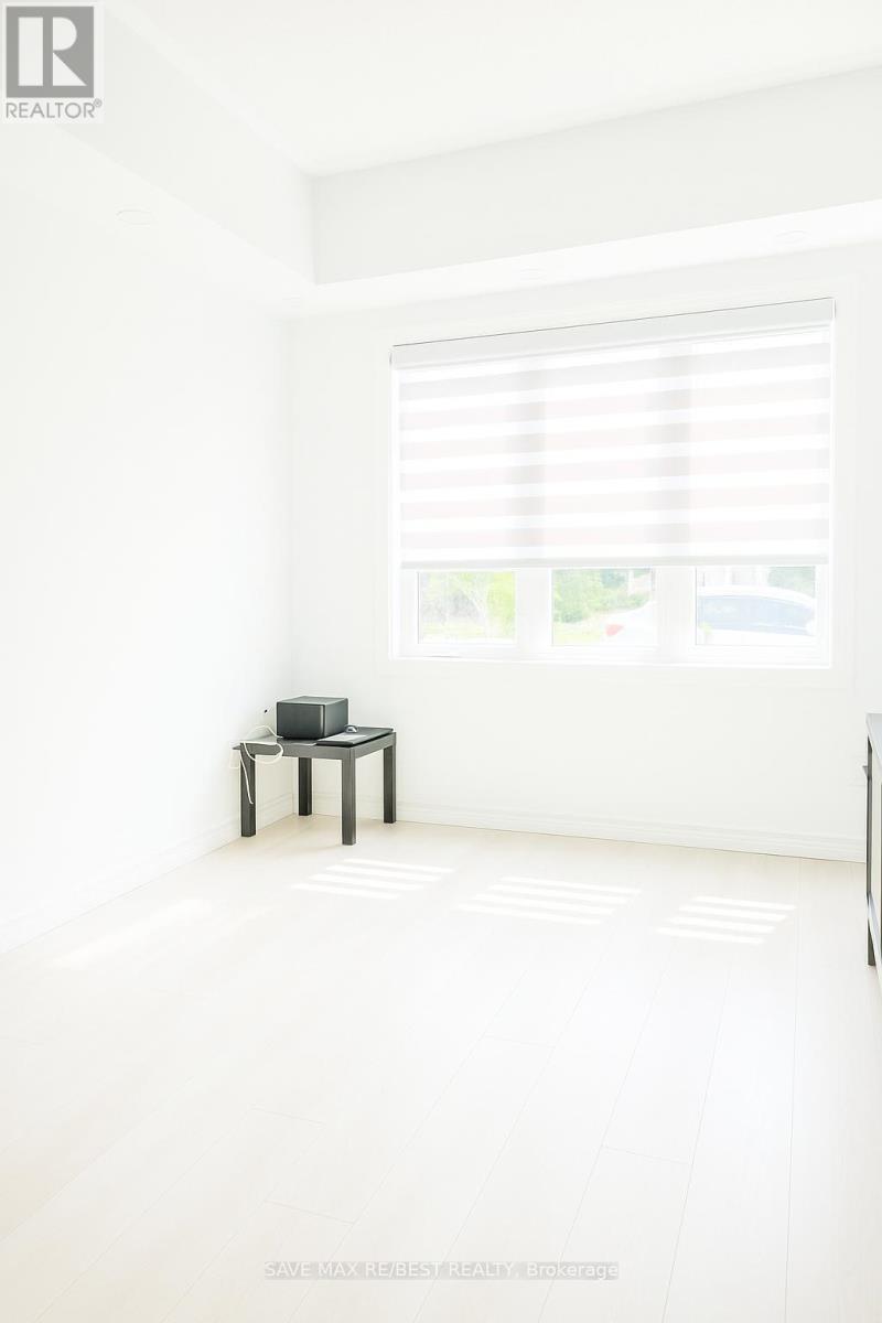108 - 263 Georgian Drive, Oakville, Ontario  L6H 0L2 - Photo 6 - W12213894