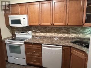 202 - 200 East Street S, Kawartha Lakes (Bobcaygeon), Ontario  K0M 1A0 - Photo 12 - X12219119