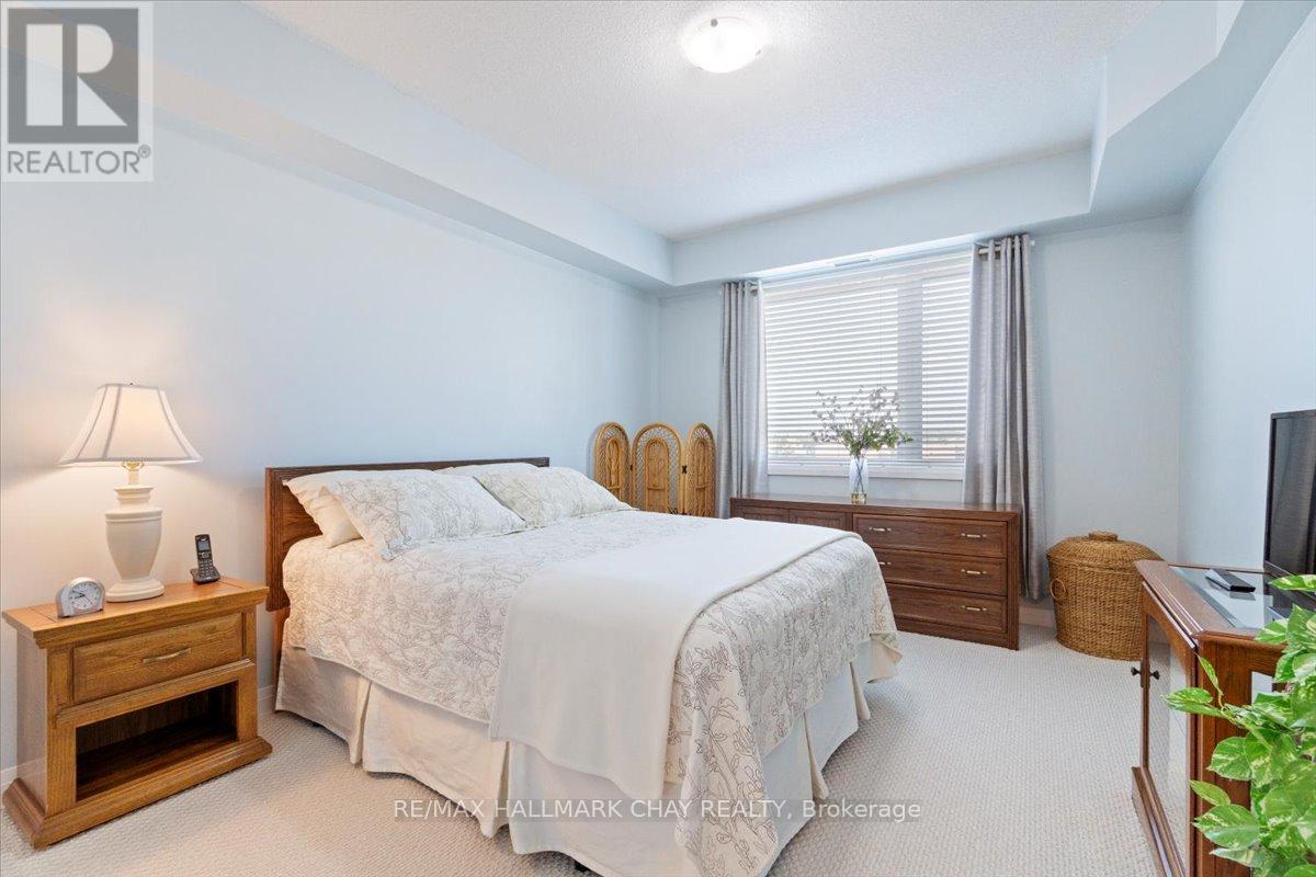 404 - 295 Cundles Road E, Barrie, Ontario  L4M 0K8 - Photo 21 - S12219561