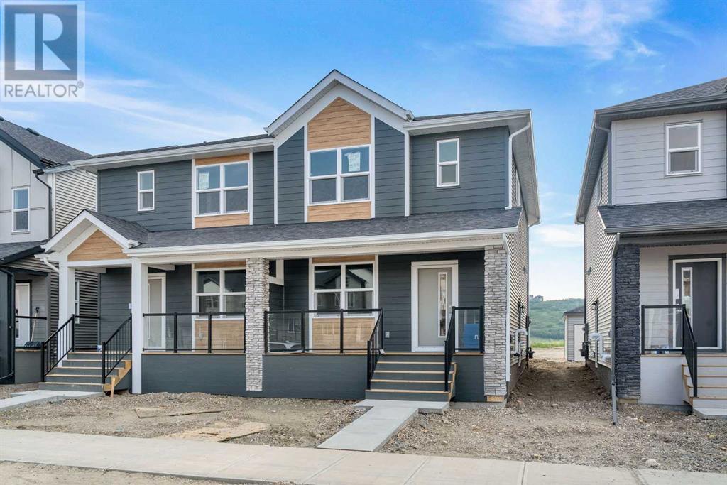 Property at 667 Wolf Willow Boulevard SE image 1