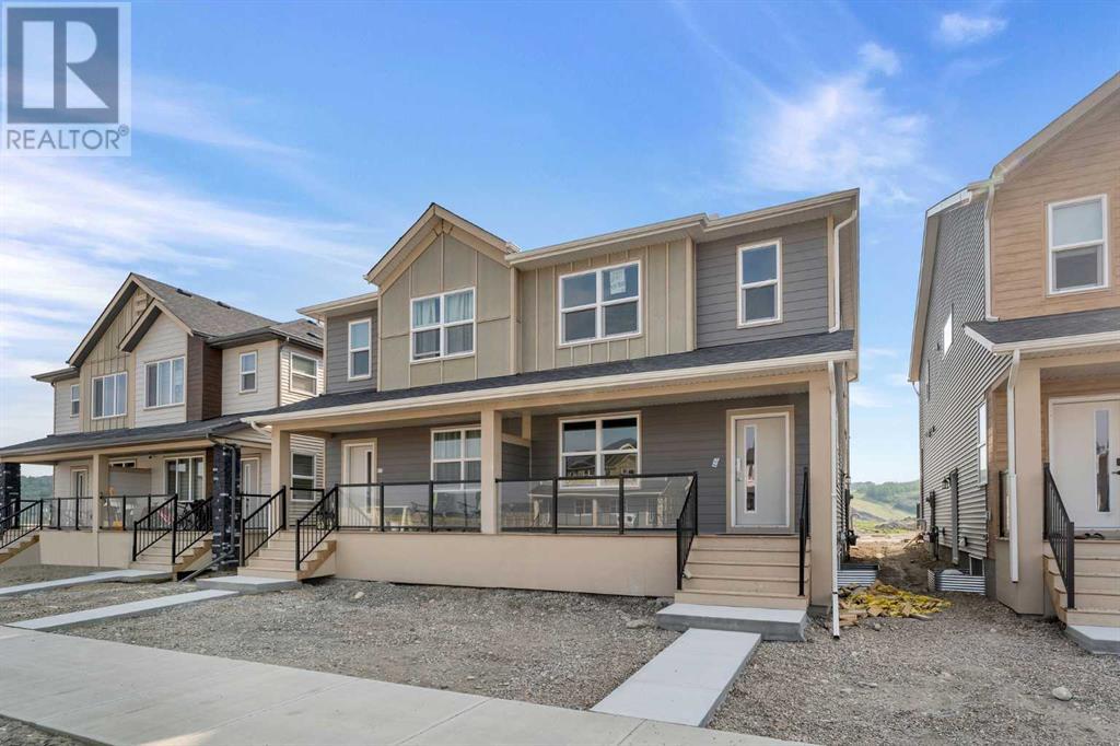 Property at 831 Wolf Willow Boulevard SE image 1