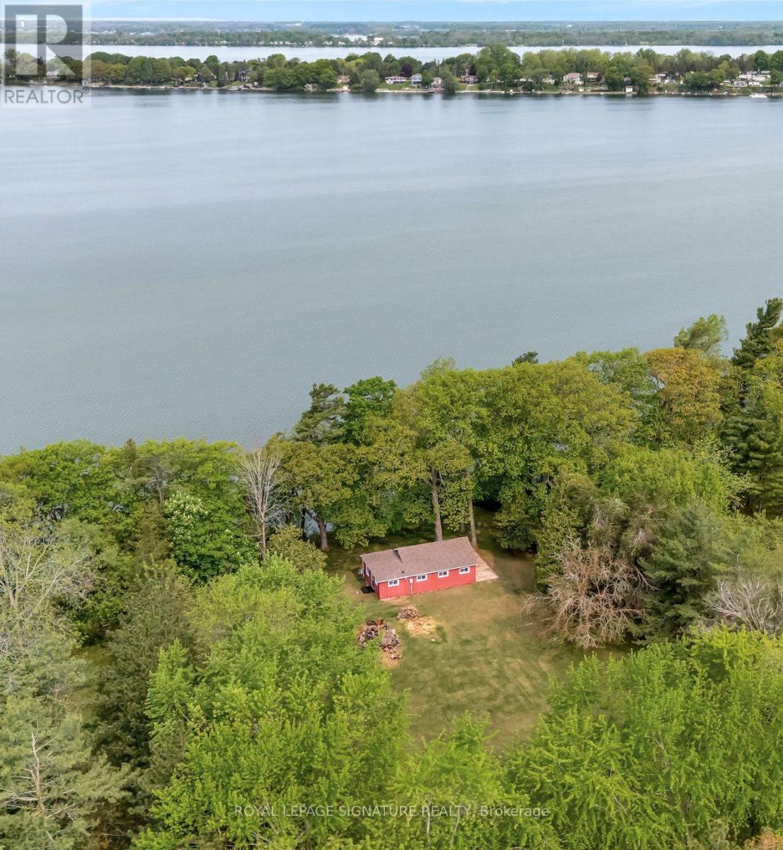 <div class="slider-price">$1,750,000</div><p>27 Thrush Lane, Prince Edward County, Ontario</p>