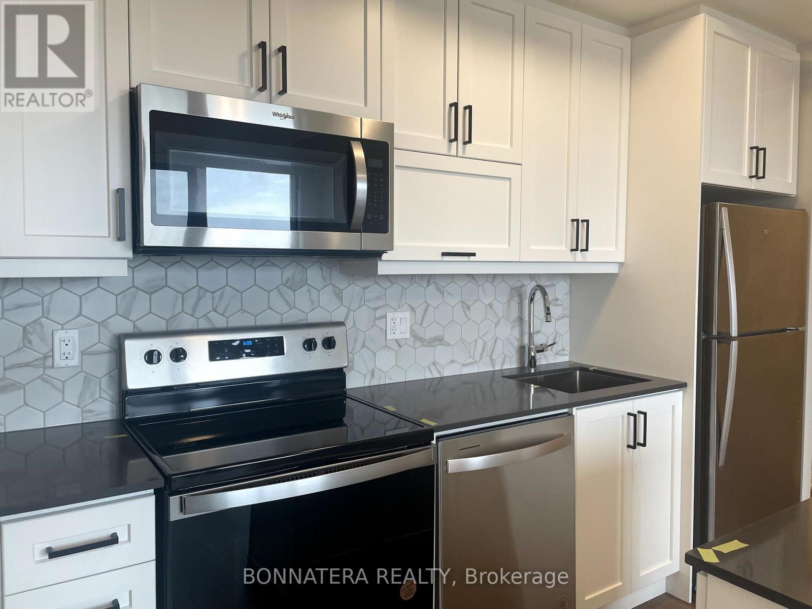 907 - 3006 William Cutmore Boulevard, Oakville, Ontario  L6H 8A4 - Photo 5 - W12218647