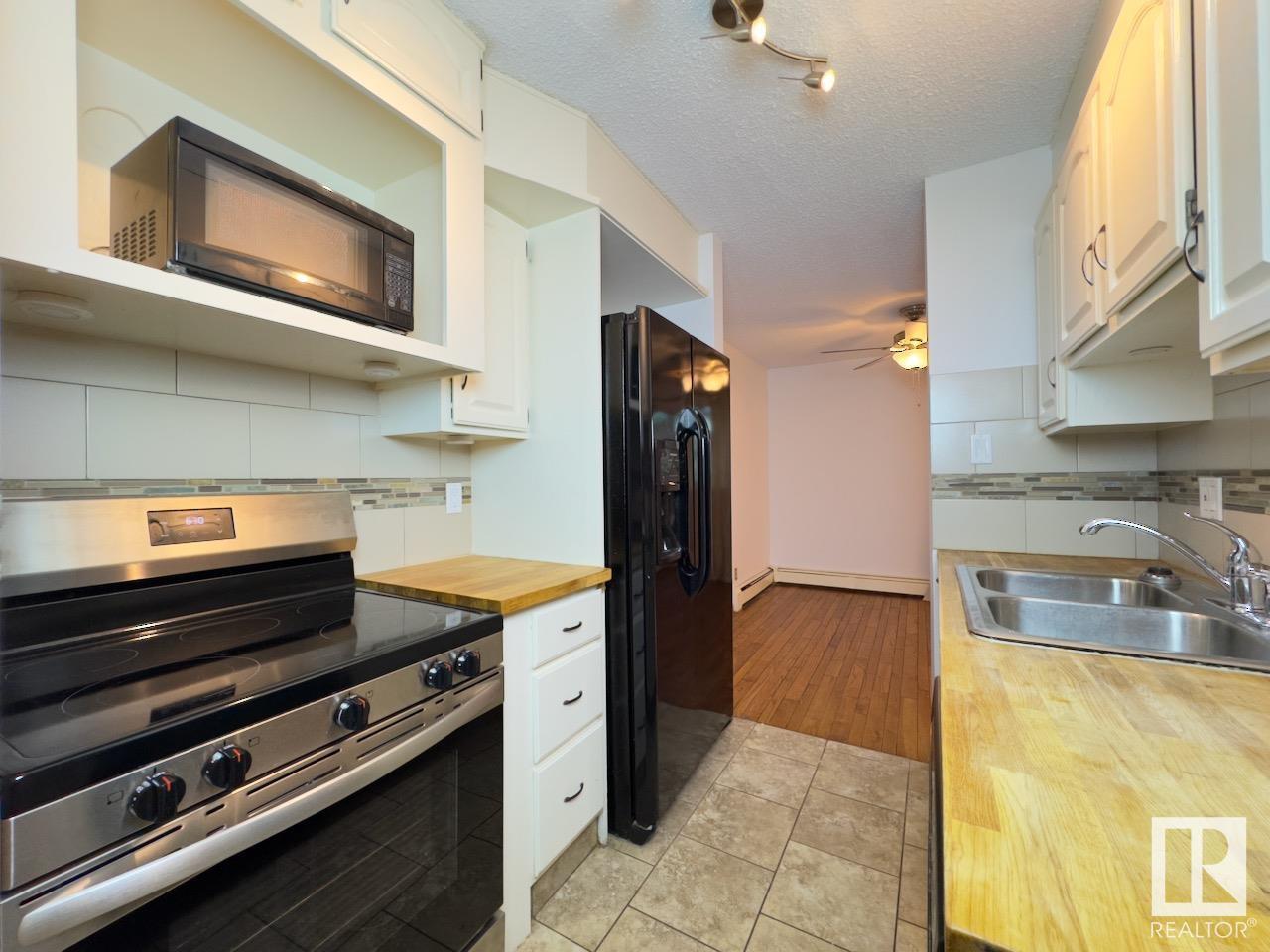Property at #323 2327 119 ST NW image 2