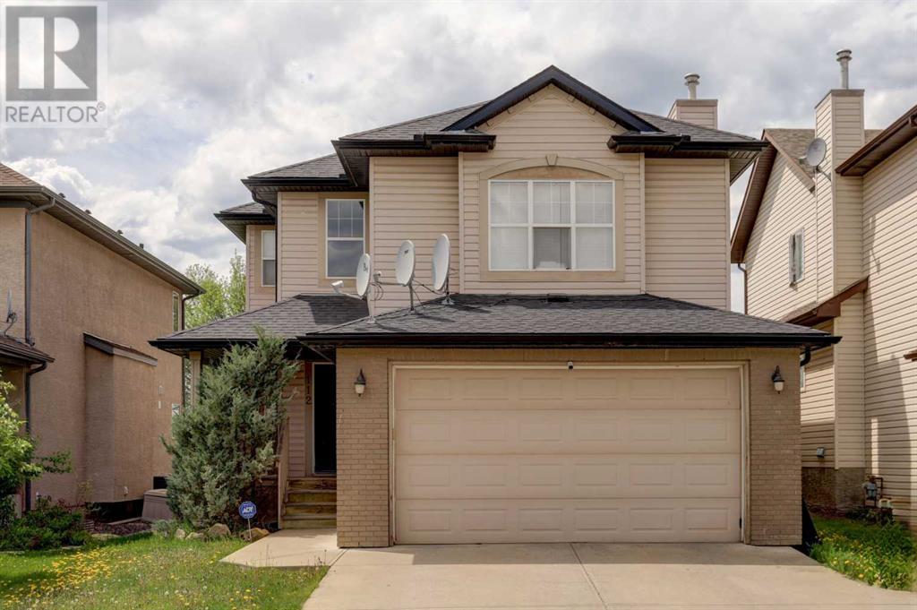 Property at 112 Cougarstone Manor SW image 1