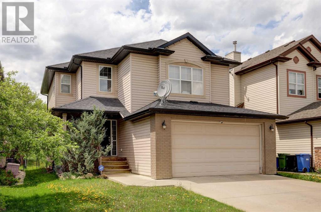 Property at 112 Cougarstone Manor SW image 2