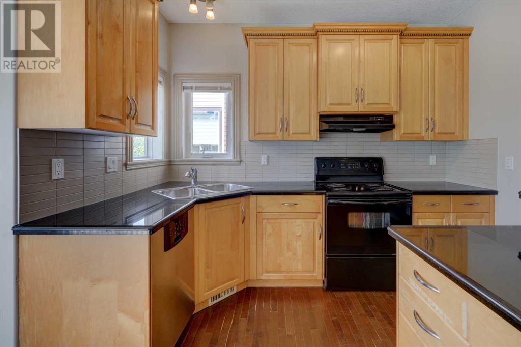 Property at 112 Cougarstone Manor SW image 5