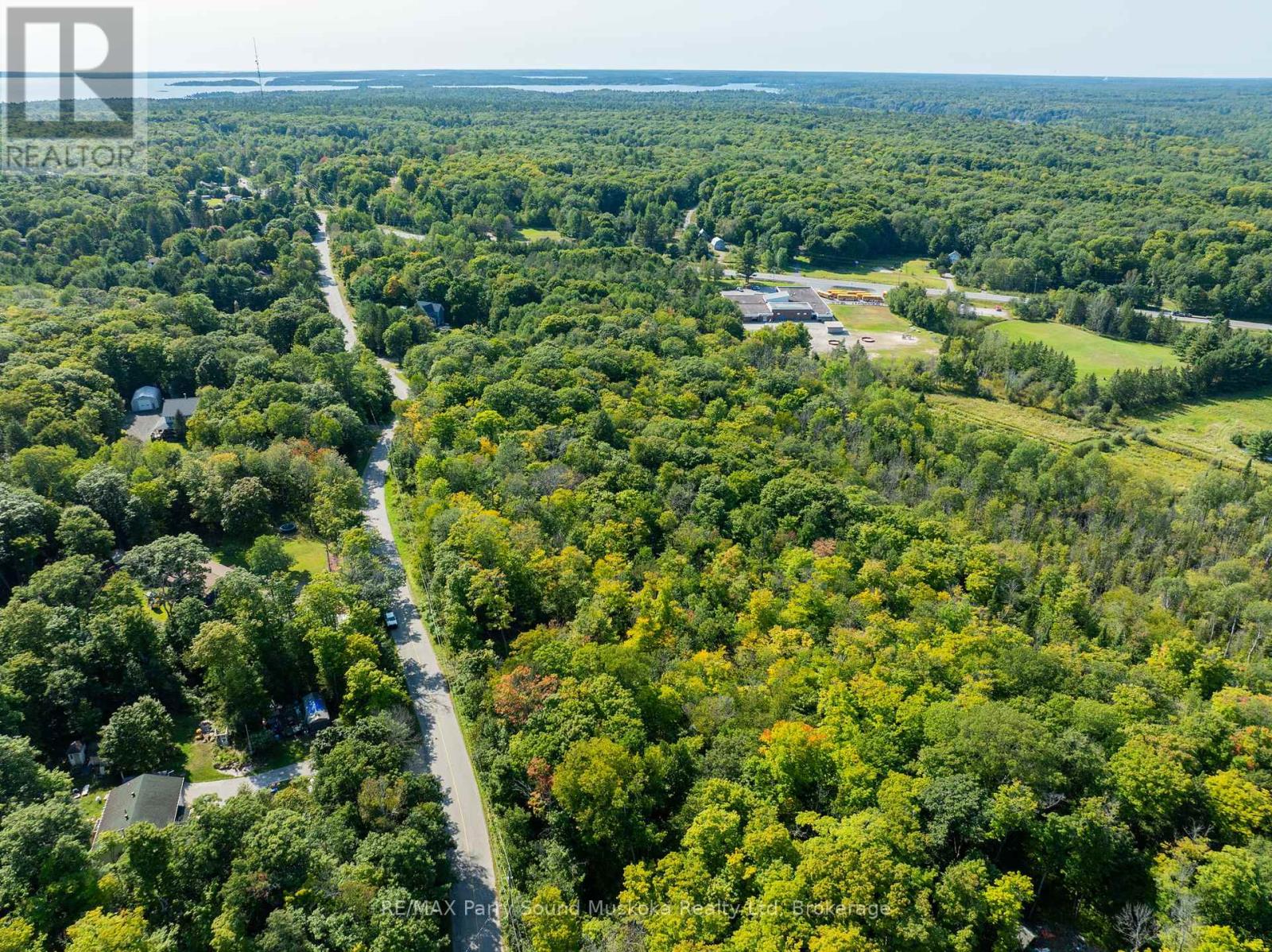 18 Burnside Bridge Road, Mcdougall, Ontario  P2A 2W9 - Photo 2 - X12221870