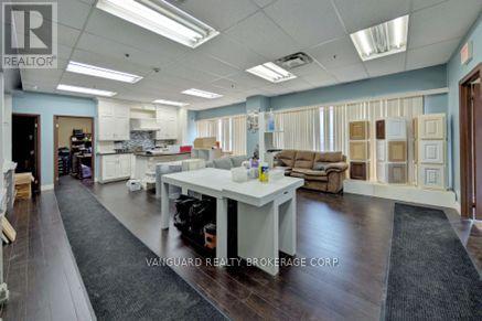 557 Fenmar Drive, Toronto (Humber Summit), Ontario  M9L 2R6 - Photo 5 - W12224466