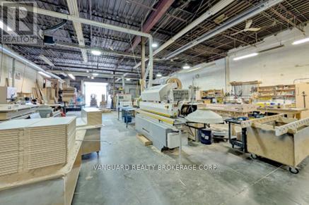 557 Fenmar Drive, Toronto, Ontario  M9L 2R6 - Photo 3 - W12224467