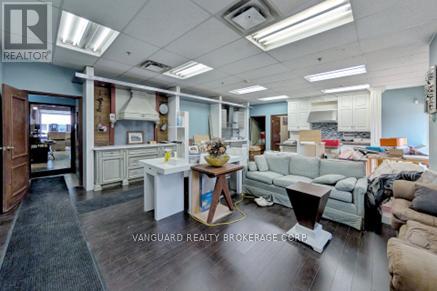 557 Fenmar Drive, Toronto, Ontario  M9L 2R6 - Photo 4 - W12224467