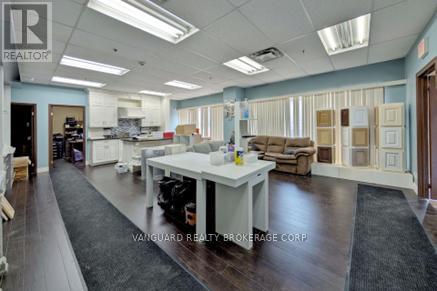 557 Fenmar Drive, Toronto, Ontario  M9L 2R6 - Photo 5 - W12224467