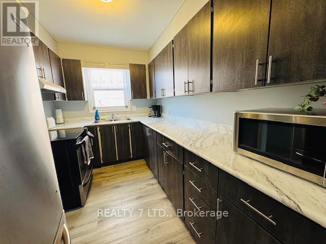 2 - 9 Donald Avenue, Toronto, Ontario  M6M 1J7 - Photo 3 - W12225022