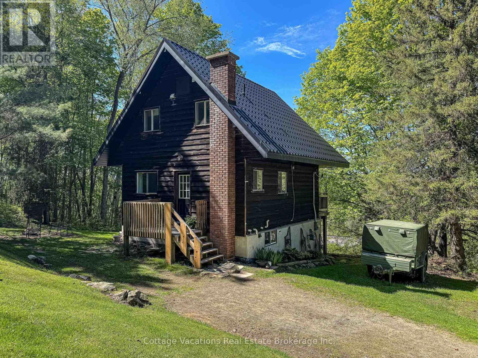 527 Aspdin Road, Huntsville, Ontario  P1H 1Y4 - Photo 5 - X12161627