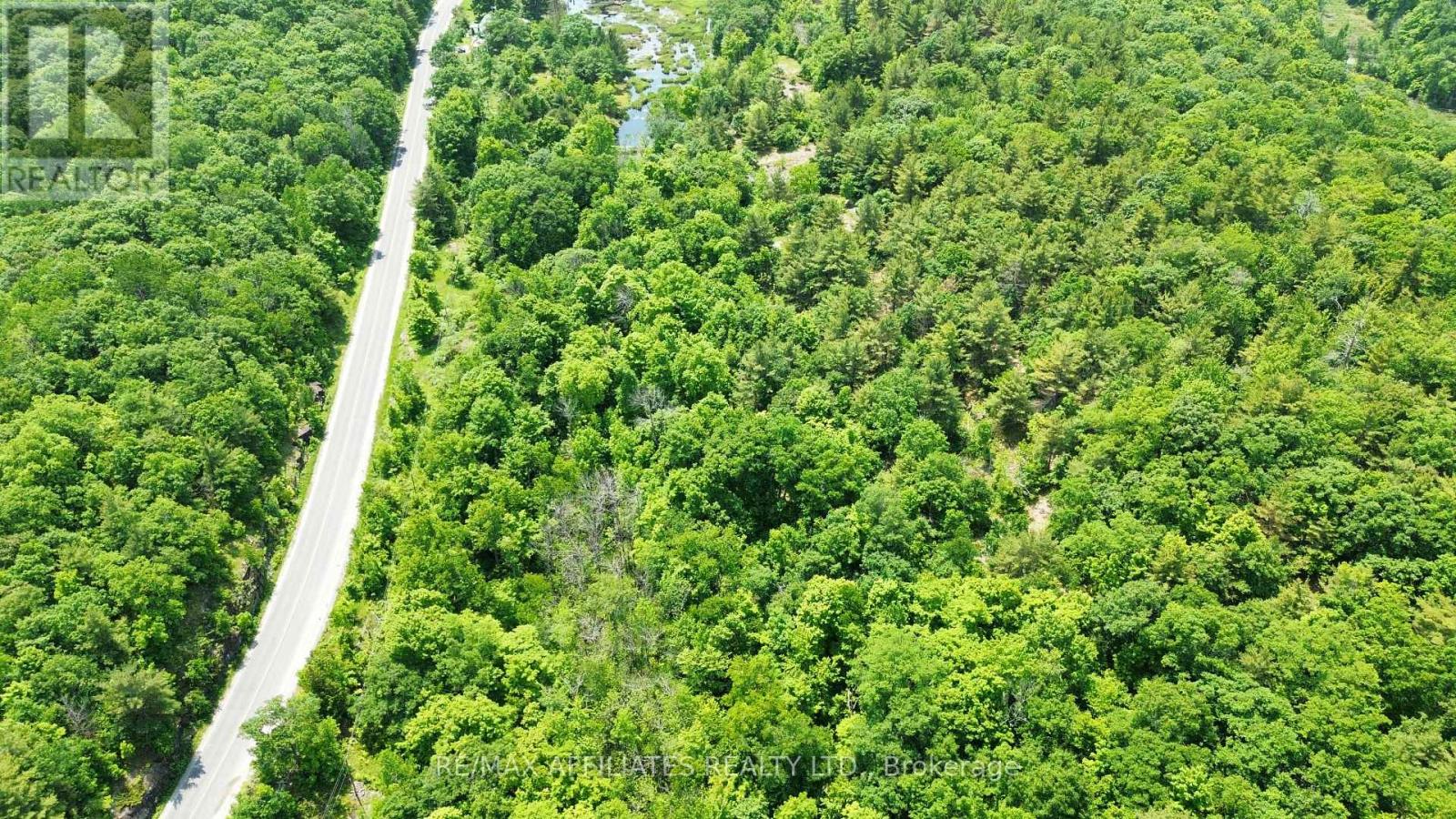 938 Crow Lake Road, Frontenac (Frontenac Centre), Ontario  K0H 2B0 - Photo 3 - X12227025