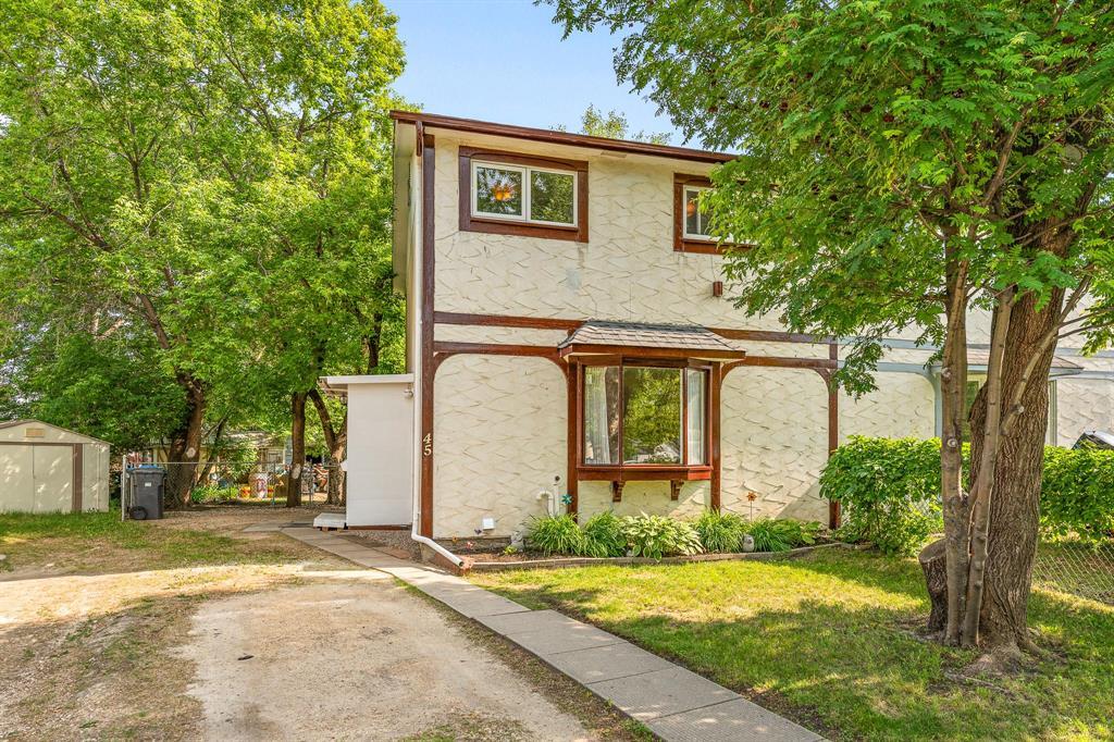 45 Madrill Close Winnipeg, Manitoba 4H//Winnipeg/Showings start June 20/2025, offers received the evening of June 26/2025. Welcome to 45 Madrill Close in The Maples! This well-kept 3-bedroom, 1.5-bath home features a bright eat-in kitchen with patio doors to the backyard, a spacious living room with timeless parquet flooring, and a partially finished basement with a large rec area and a built-in workbench ideal for hobbies or crafts. Outside, enjoy the quiet cul-de-sac location and a huge pie-shaped backyard filled with mature trees. Four versatile garden sheds offer tons of storage or could be used as workshops or hobby spaces. The driveway out front is fit for 3 vehicles. Notable updates include:New shingles (2024), High-efficiency gas furnace (2021), Electric Rheem water heater (2022), Some windows (2017). Close to parks, schools, shopping, and transit. Party wall agreement in place. (id:48254)