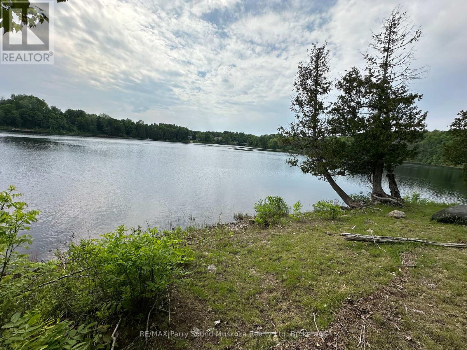 47 Shady Maple Trail, Whitestone, Ontario  P0A 1G0 - Photo 3 - X12233694