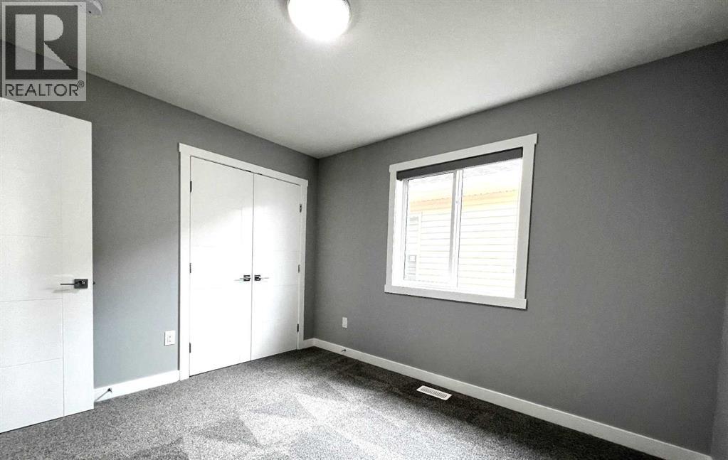 819 Edgefield Street, Strathmore, Alberta  T1P 0H6 - Photo 14 - A2219234