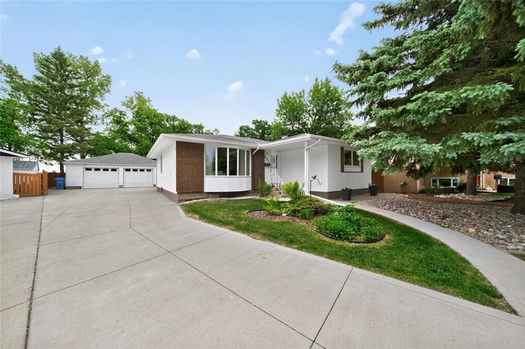 203 Risbey Crescent Winnipeg, Manitoba 5H//Winnipeg/Offers Reviewed Weds June 25th at 6pm. 203 Risbey Crescent is the kind of home that rarely hits the market. Tucked onto a quiet crescent in Crestview, this 1500+sqft 3BD 2.5BA bungalow sits on a sprawling, beautifully landscaped lot complete with mature trees, stone walkways and an expansive deck perfect for summer BBQs. You are sure to enjoy this yard year round! Inside, you ll find a bright living room with a large bay window overlooking the front yard, a formal dining space and a warm & inviting kitchen with peninsula seating that opens into a fantastic den that leads right to the backyard retreat. 3 spacious bedrooms on the main floor (including a king-sized primary with ensuite access). The finished basement is filled charm and functionality. It includes a large rec space, bar area, bathroom, laundry/workshop zone. Plus you are sure to love the oversized double garage that offers workshop potential and the long driveway that can easily handle guests. This one-owner home has been impeccably cared for for many years and is one that will make your heart smile. Located close to schools parks and more. his is Crestview living at its best.This is a must see! (id:48254)