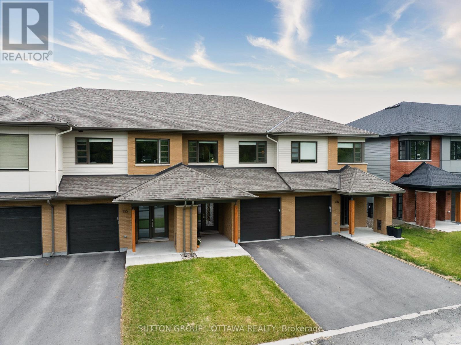 737 Acai Way Ottawa, Ontario WONDERFUL home in Riverside South close to future LRT and towncentre! Nestled on a quiet street, this townhome built by AWARD-WINNING HN HOMES where every detail is designed to impress. The moment you walk in, you're greeted with a BRIGHT, OPEN ENTRY, complete with MODERN GLASS RAILINGS and UPGRADED POT LIGHTS that set the tone for the stylish vibe ahead. The kitchen is straight-up STUNNING, featuring STAINLESS STEEL APPLIANCES, CLASSIC SUBWAY TILE, WHITE QUARTZ COUNTERS, and ASH-TONE FLOORING that flows seamlessly into MATCHING CABINETSits giving DESIGNER LIVING, and yes, it feels even better in person. The MAIN FLOOR is COMPLETELY OPEN CONCEPT, with 9FT CEILINGS and MASSIVE WINDOWS that flood the space with NATURAL LIGHT. The LIVING ROOM brings serious character with its STATEMENT-MAKING FIREPLACE WALL, and the DINING AREA opens to your PRIVATE BACKYARD w/ NO REAR NEIGHBOURS, just good vibes and TOTAL PRIVACY. Upstairs, the PRIMARY BEDROOM is a TOTAL RETREAT with COFFERED CEILINGS, a SPA-LIKE ENSUITE with DOUBLE VANITY and LARGE WALK-IN SHOWER, and a WALK-IN CLOSET thats ready for all your style. And that UNOBSTRUCTED BACKYARD VIEW? It keeps going. FORGET THE NEIGHBOURS WINDOW VIEW, UP HERE ITS ALL PEACE, SKY, AND YOUR OWN SPACE. (id:48254)