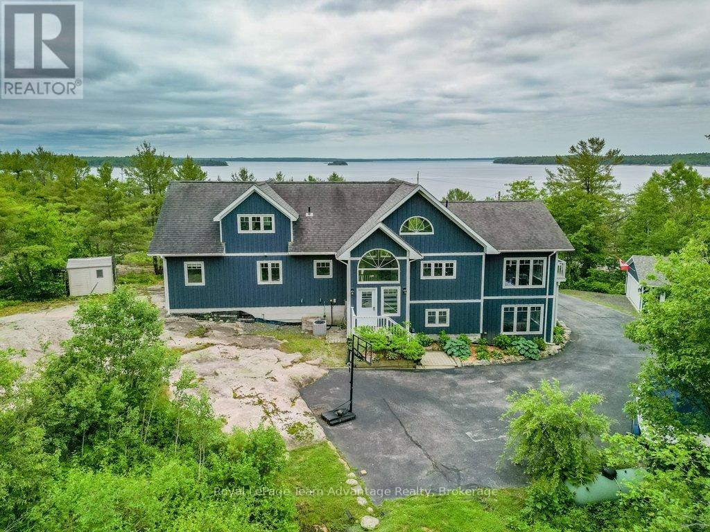 39 Big Sound Road, Mcdougall, Ontario  P0G 1G0 - Photo 4 - X12238154