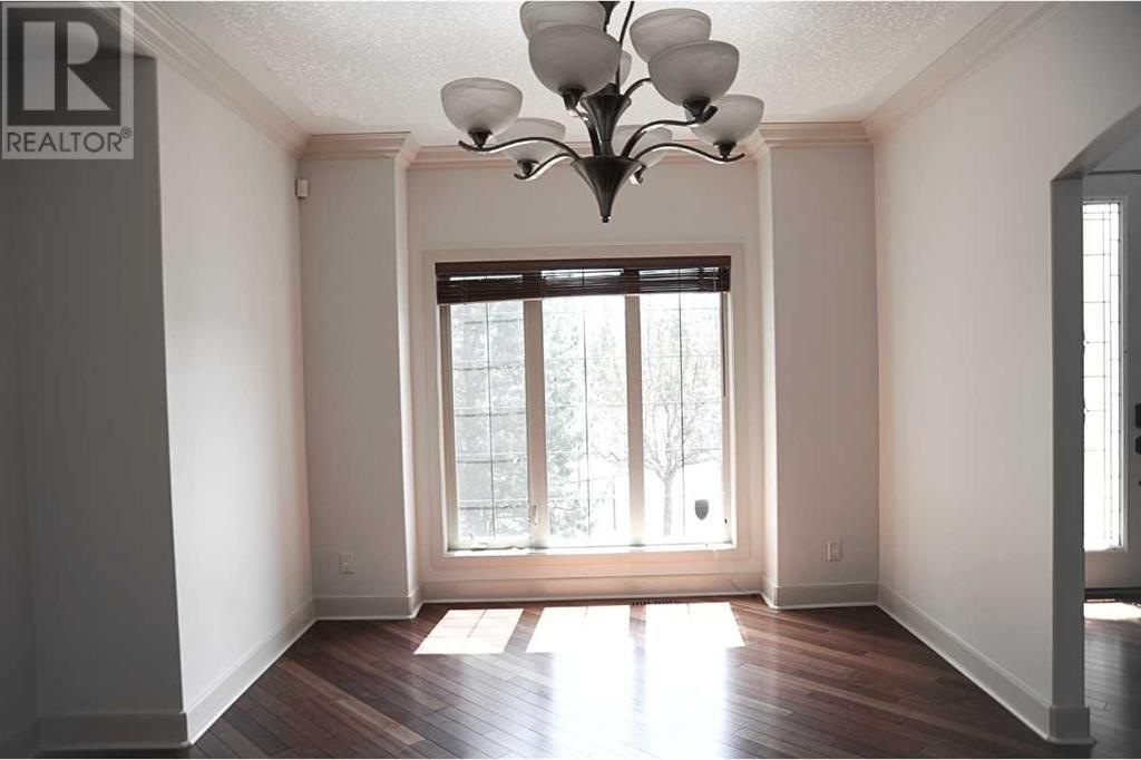 Property at 31 Cougarstone Point SW image 3