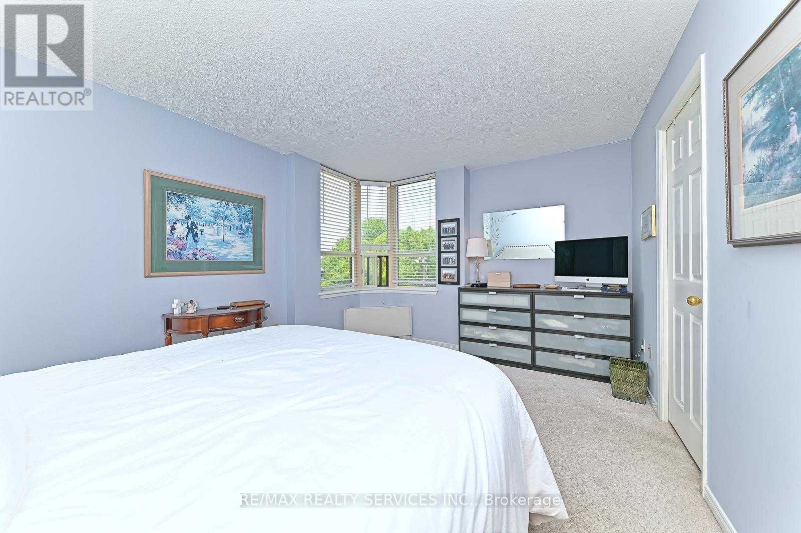 402 - 58 Church Street E, Brampton, Ontario  L6V 4A8 - Photo 15 - W12240415