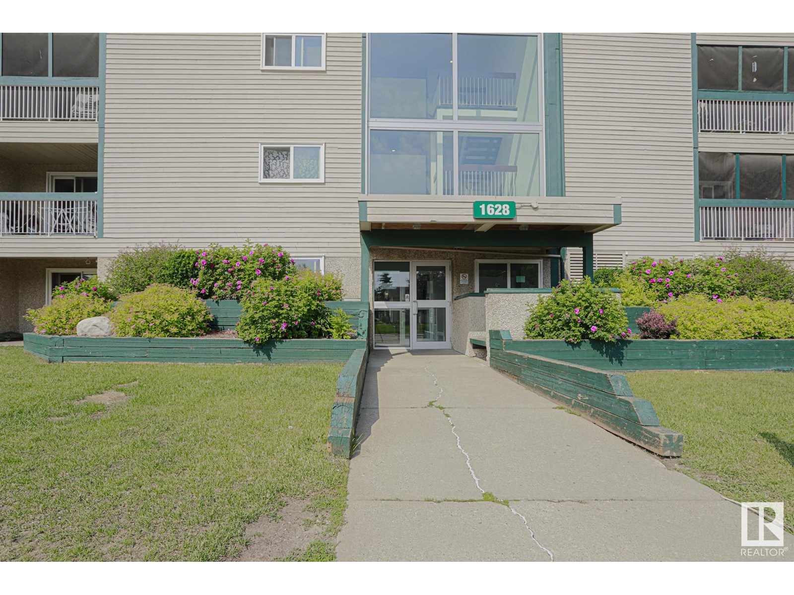 Property at #112 1628 48 ST NW NW image 1