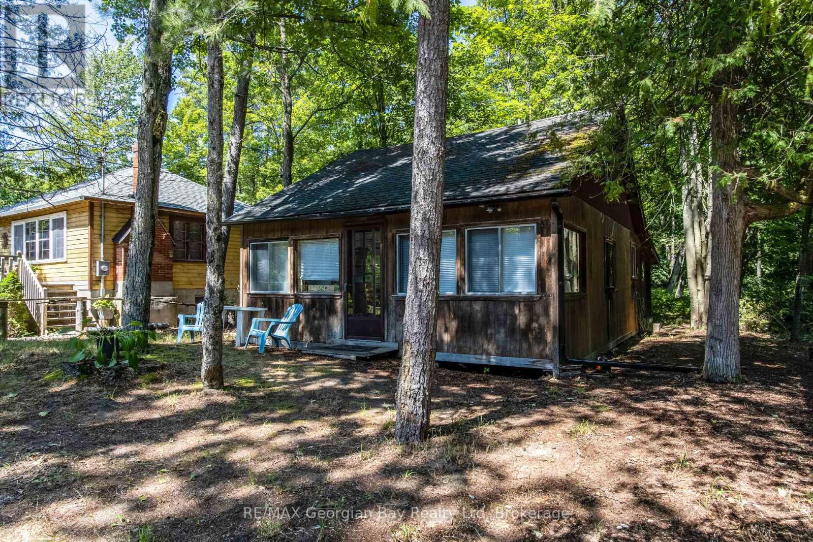 1209 Tiny Beaches Road S, Tiny, Ontario  L0L 2T0 - Photo 1 - S12218431