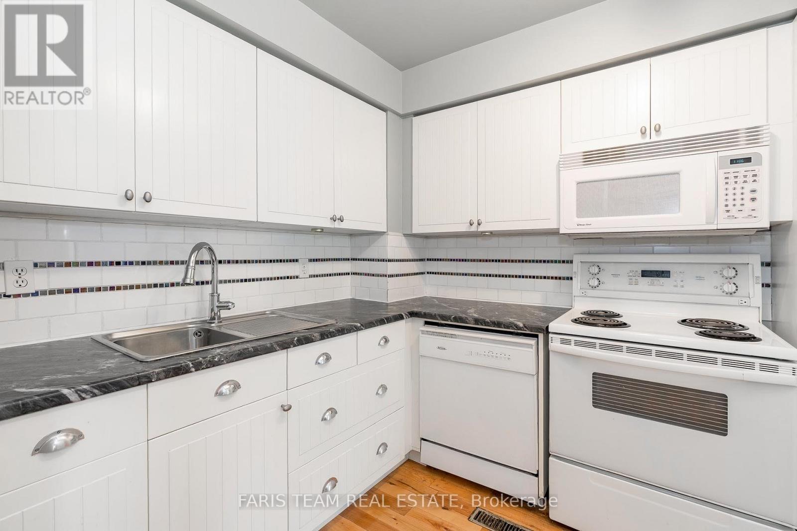 7 - 52 Adelaide Street, Barrie, Ontario  L4N 3T5 - Photo 4 - S12242453