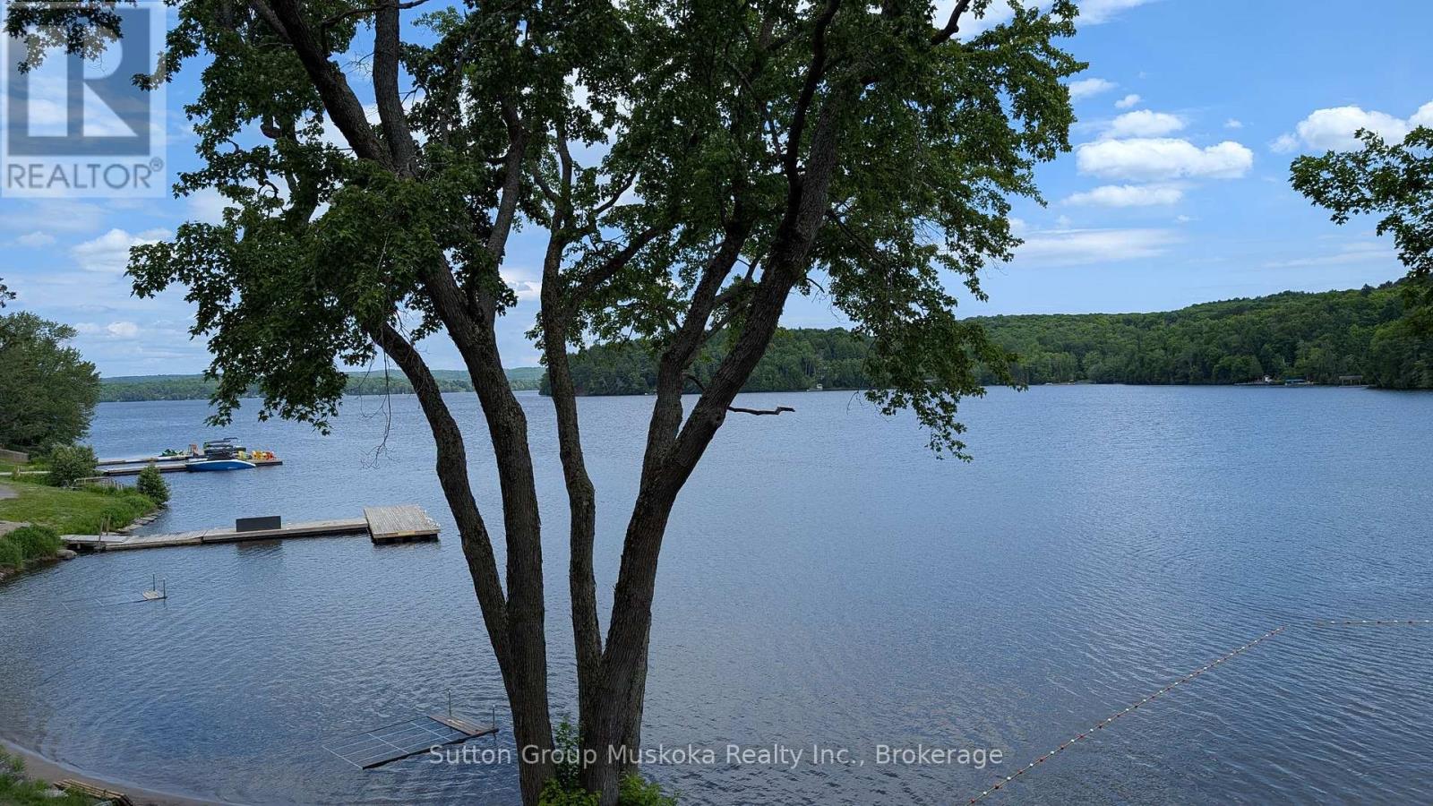 215 Bayshore - 1235 Deerhurst Drive, Huntsville, Ontario  P1H 2E8 - Photo 2 - X12195423