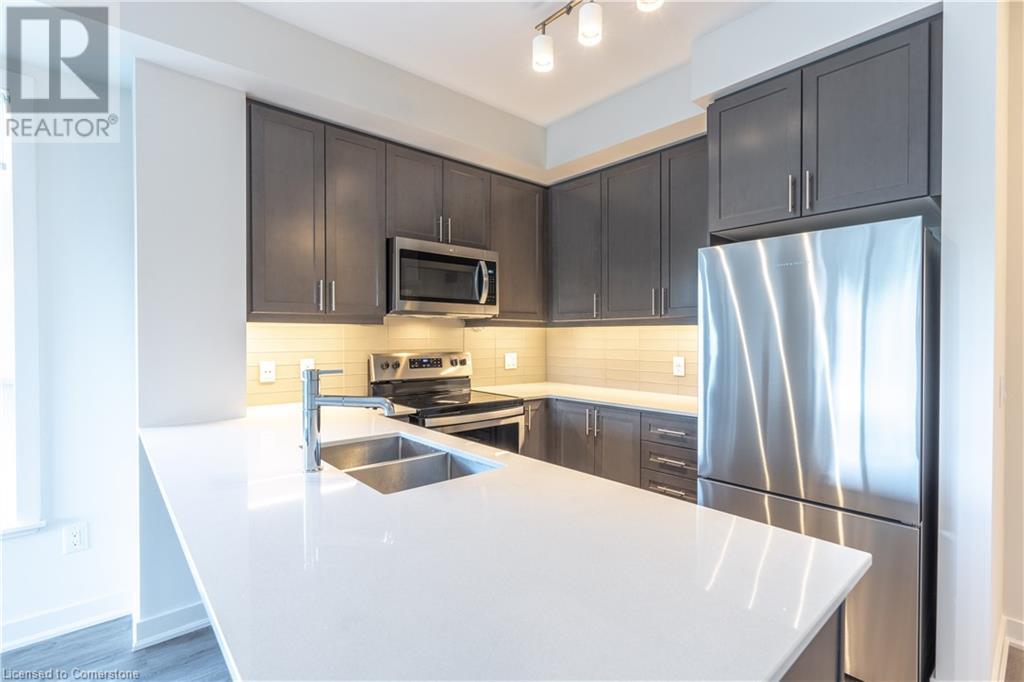 Property at 320 PLAINS Road E Unit# 306 image 2
