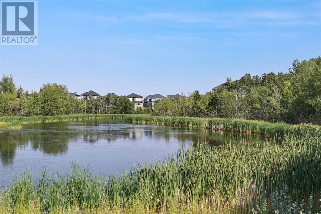 Property at 141 Rockcliff Bay NW image 4