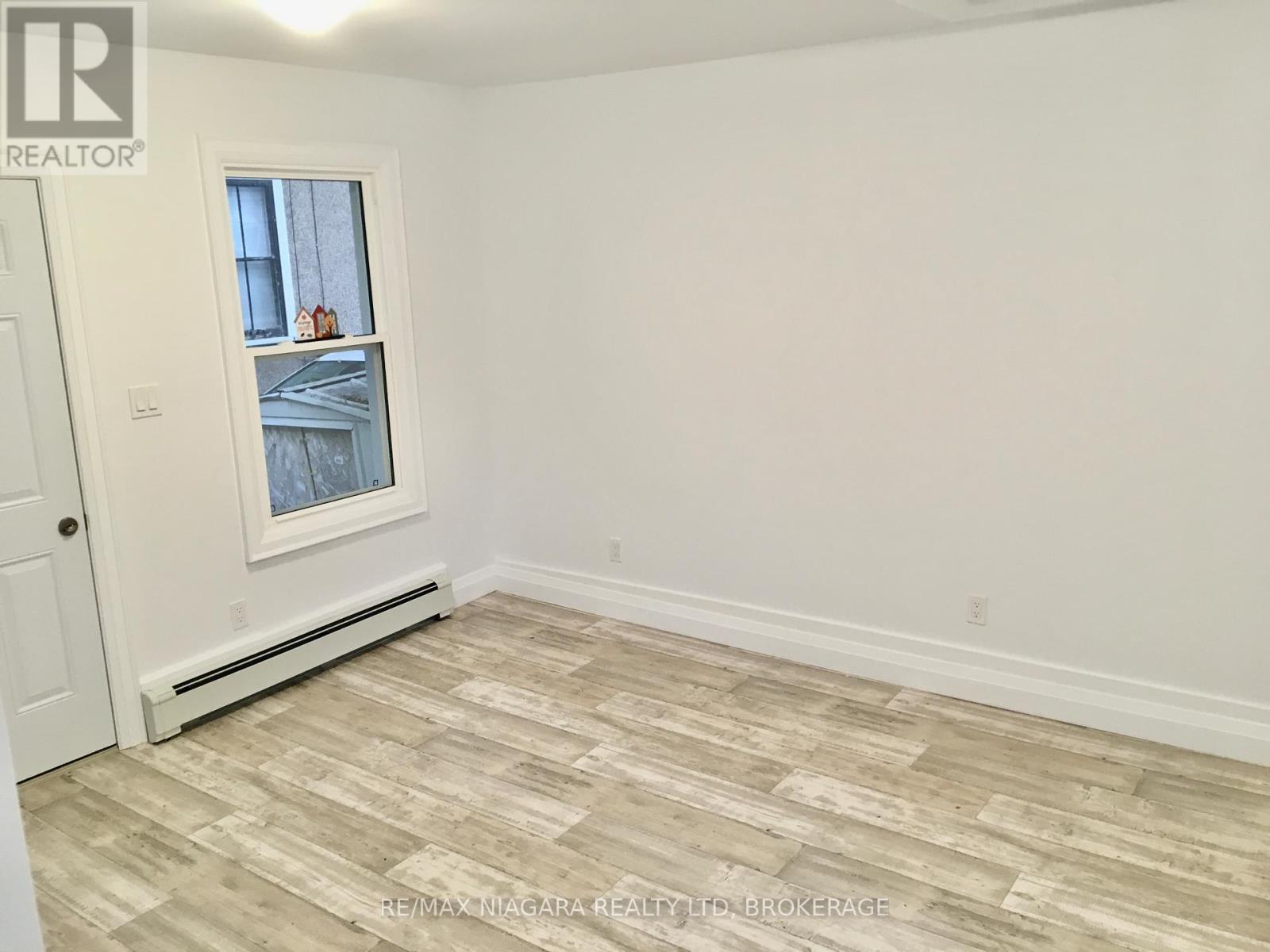 Rear Unit - 163 Welland Avenue, St. Catharines (Downtown), Ontario  L2R 2N9 - Photo 8 - X12245949