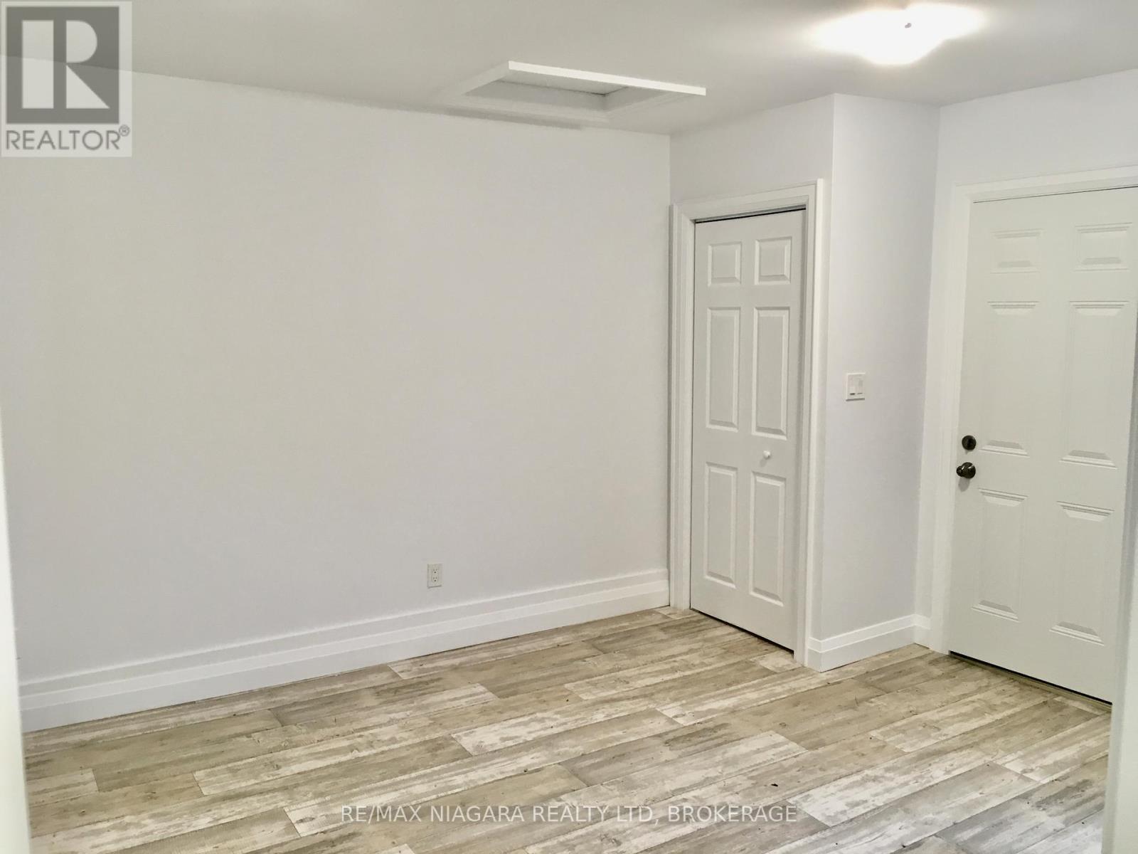 Rear Unit - 163 Welland Avenue, St. Catharines (Downtown), Ontario  L2R 2N9 - Photo 9 - X12245949