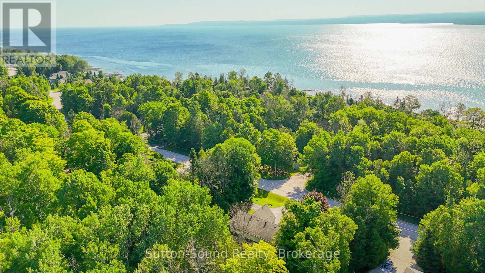 168 Balmy Beach Road, Georgian Bluffs, Ontario  N4K 5N4 - Photo 2 - X12246418