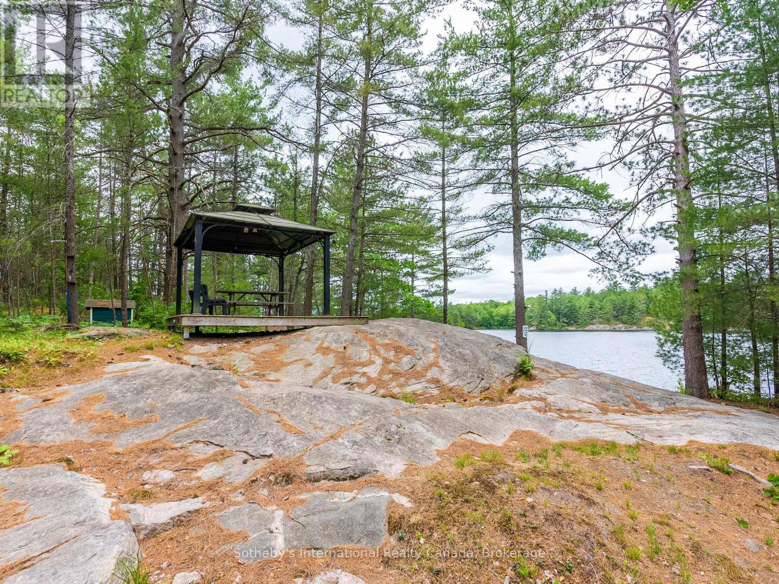 1040 Kahshe Lake, Gravenhurst, Ontario  P0E 1G0 - Photo 24 - X12246033