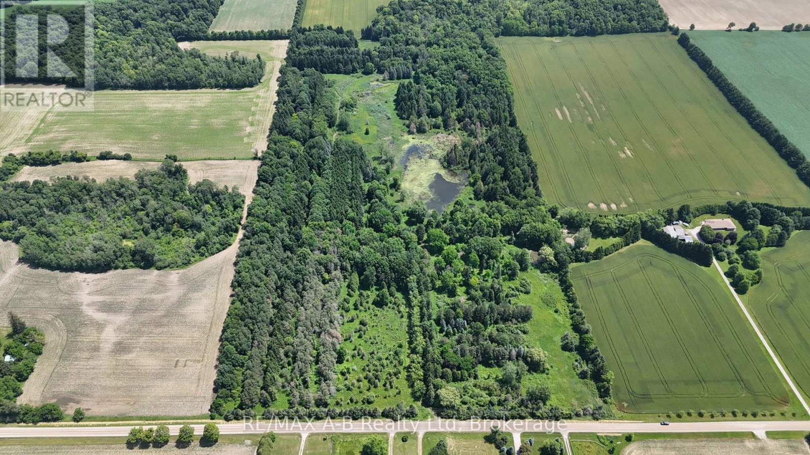 20975  Cherry Hill Road  Thames Centre, Ontario Rare opportunity to own a beautiful 50-acre parcel of land. Filled with mature trees, the property also features two ponds and scenic trails, creating a serene and private setting, perfect for a dream home or peaceful country retreat. Ideally situated between London, Thorndale, and Thamesford, you'll enjoy the convenience of nearby amenities while having your own natural sanctuary. Be sure to explore the photos, then contact your REALTOR to book a private tour of this truly special property. (id:48254)