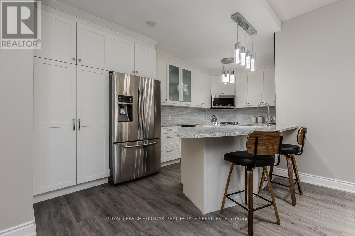 219 - 2075 Amherst Heights Drive, Burlington (Brant Hills), Ontario  L7P 5B8 - Photo 1 - W12247332