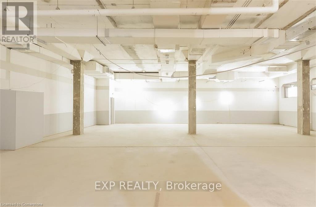 106 - 30 Duke Street W, Kitchener, Ontario  N2H 3W4 - Photo 4 - X12250270