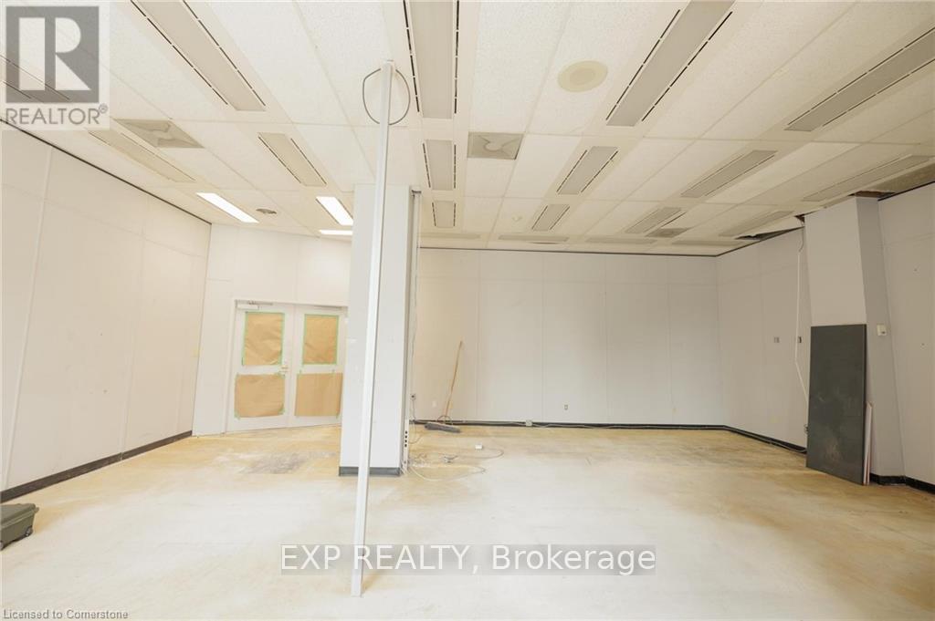 110 - 30 Duke Street W, Kitchener, Ontario  N2H 3W4 - Photo 10 - X12250271